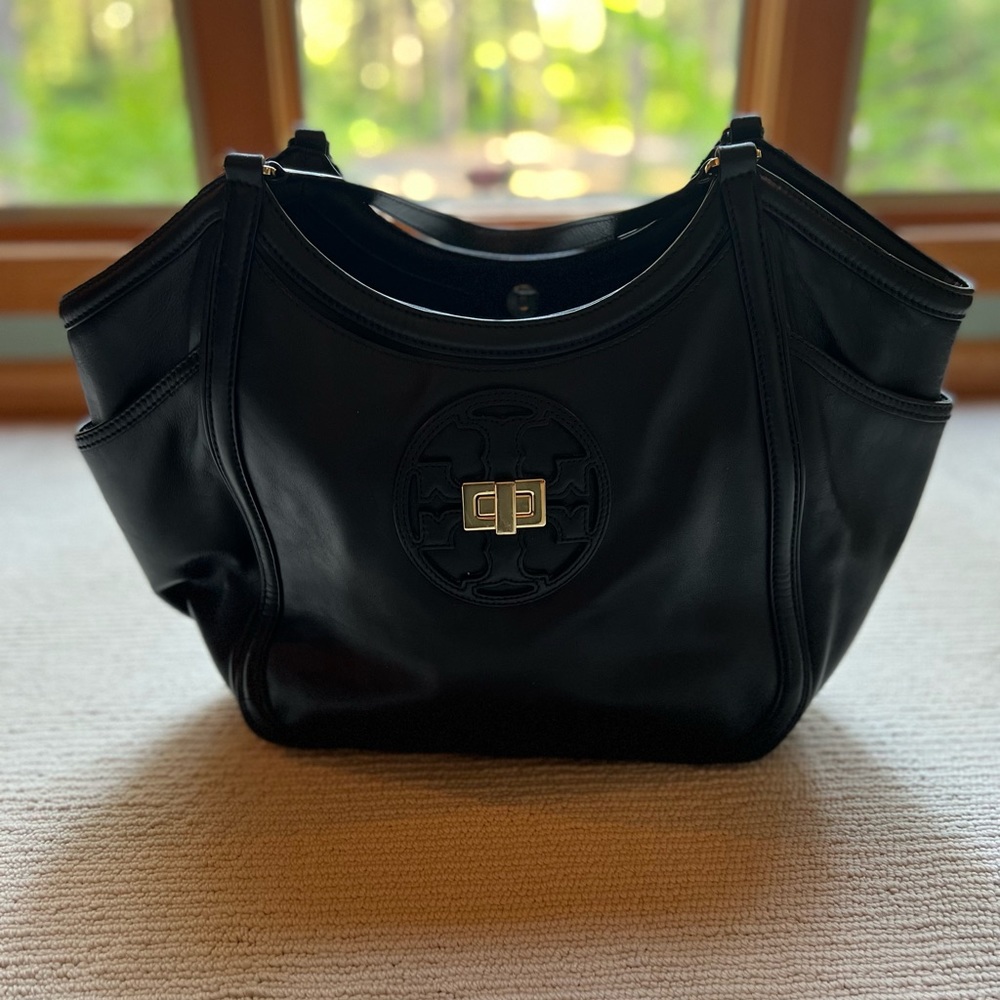Black leather Tory Burch purse.